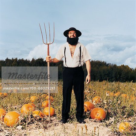 Homme au champ de citrouilles