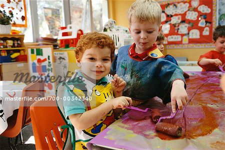 Children Painting in Classroom