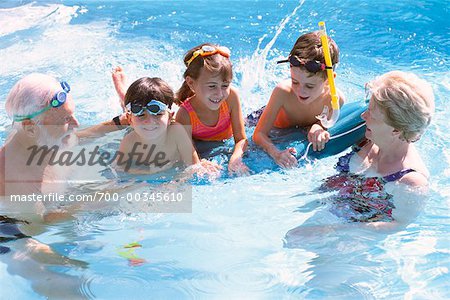 Grandparents and Grandchildren in Swimming Pool