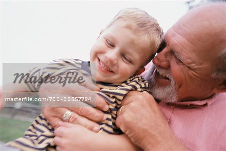 Man Tickling Grandson