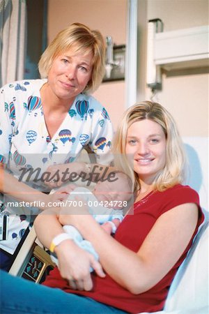 Portrait of New Mother With Nurse and Baby