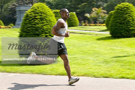 Man Jogging in Park