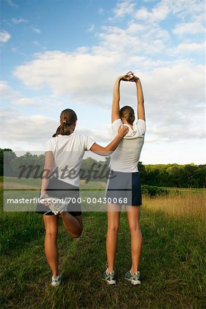 Two Girls Stretching
