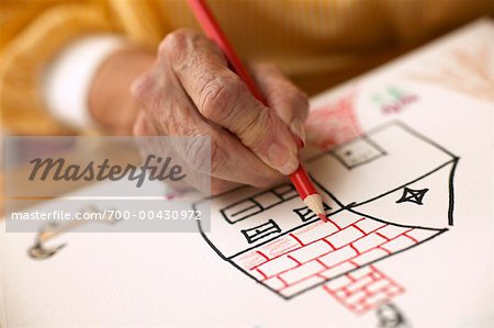 Woman Drawing a House