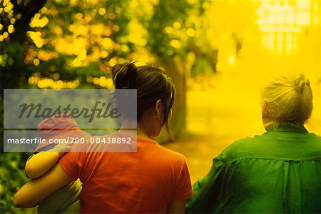 Three Generations Walking Outdoors