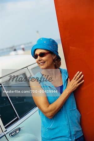 Portrait of Woman with Surfboard