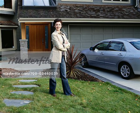 Woman in Front of House and Car