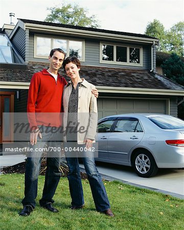 Couple in Front of Home and Car