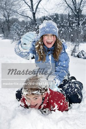 Two Girls Playing in the Snow