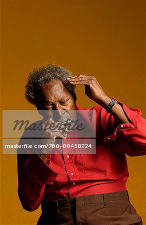 Man Playing Harmonica