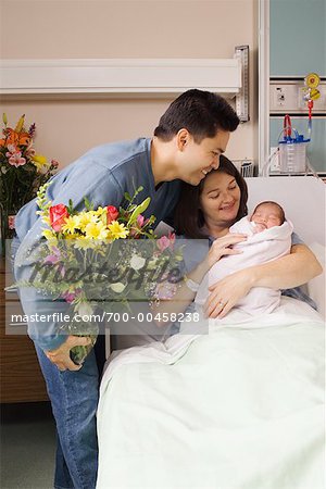 Man Visiting Wife and Newborn Baby