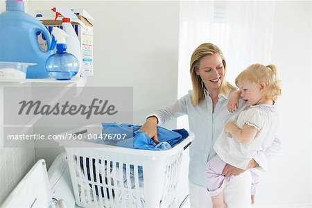 Mother and Daughter Doing Laundry