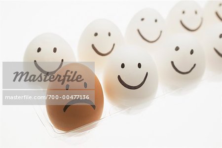 Eggs with Happy and Sad Faces
