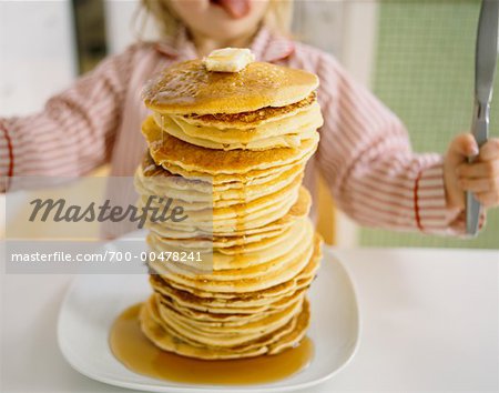 Stack of Pancakes with Excited Girl
