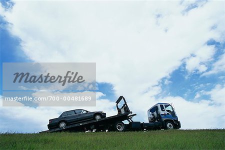 Truck Towing Car