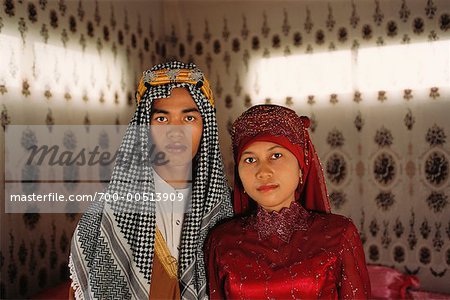Bride and Groom in Traditional Wedding Dress
