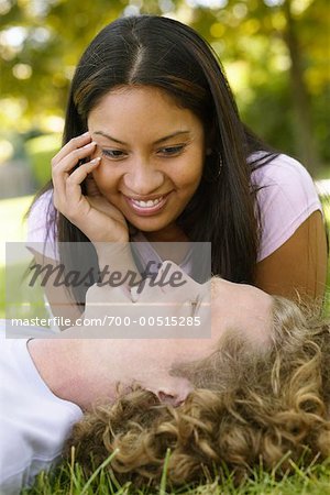 Couple Lying in Grass