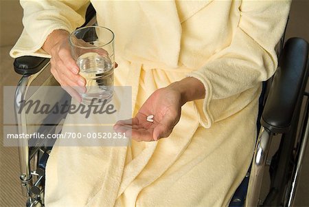 Woman Holding Pill