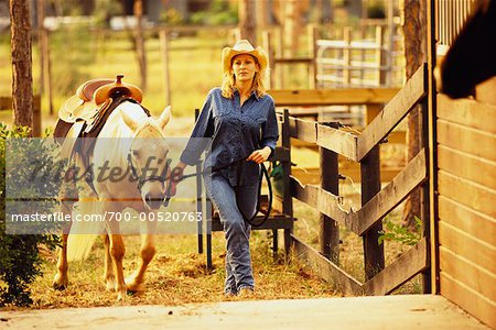 Woman Leading Horse