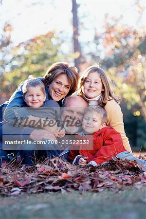 Portrait of Family Outdoors in Autumn