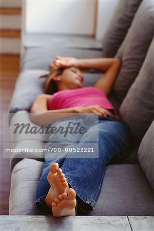 Woman Lying on Sofa