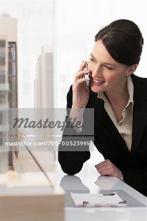 Businesswoman Using Cellular Telephone