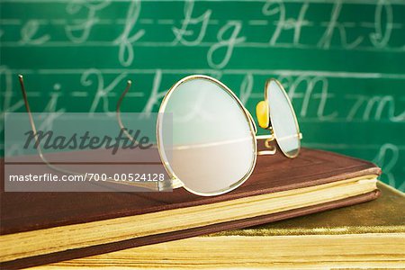 Glasses on Stack of Books