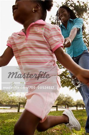 Mother and Daughter Running