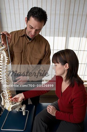 Chiropractor with Client