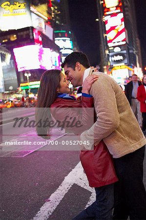 Couple Hugging in Times Square, New York City, New York, USA