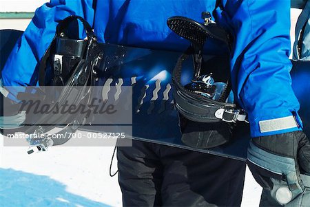 Person Carrying Snowboard