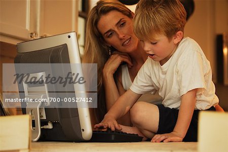 Son and Mother using Computer