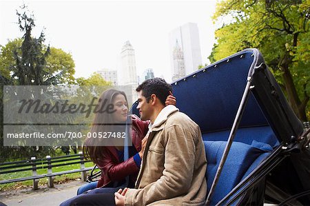 Couple Riding in Carriage, Central Park, New York City, New York, USA