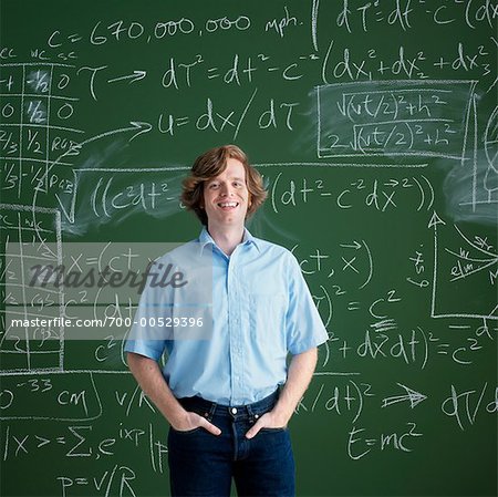 Portrait of Man in Front of Chalkboard