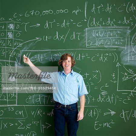 Portrait of Man in Front of Chalkboard
