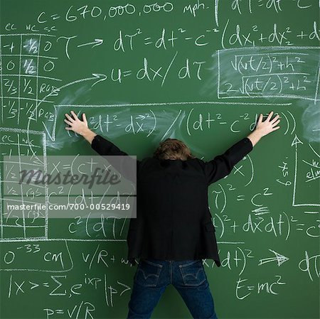 Man Spreading Arms and Legs in Front of Chalkboard