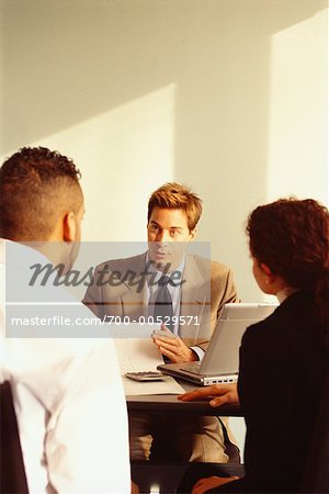 Financial Advisor Meeting with Young Couple