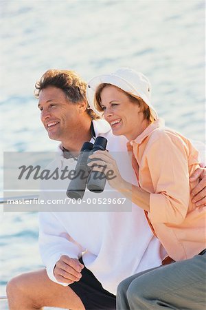 Man and Woman with Binoculars