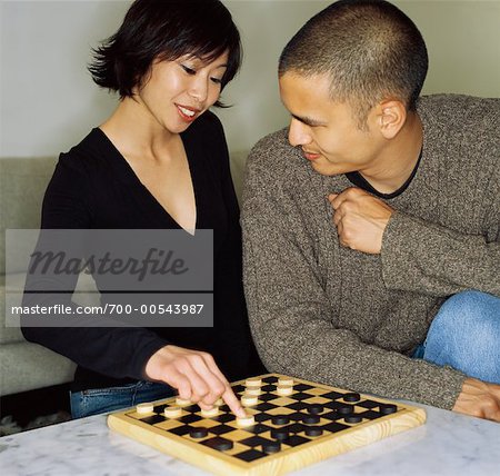 Couple Playing Checkers