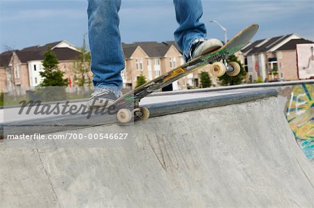 Man's Legs and Skateboard