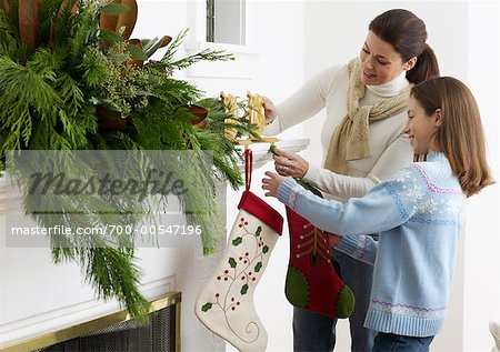Mother and Daughter Decorating for Christmas