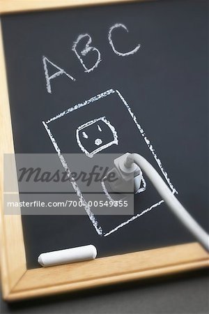 Electrical Cord Plugged into Chalkboard