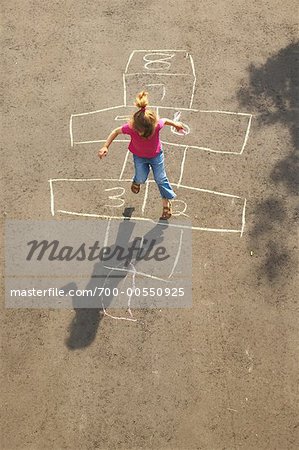 Girl Playing Hopscotch