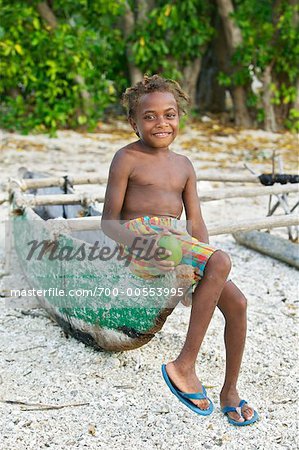Girl With A Mango On The Beach, White Grass Ocean Resort, Tanna, Vanuatu