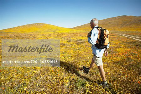 Man Hiking in Field