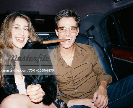 Portrait of Couple in Backseat of Car