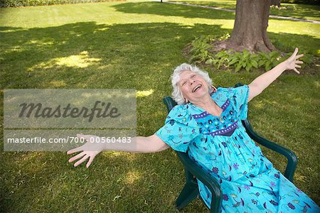 Woman Relaxing in Backyard