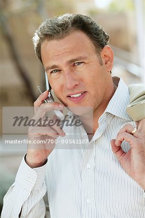 Businessman Using Cellular Telephone