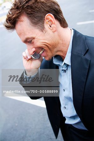 Man in Parking Lot, Talking On Cellular Telephone