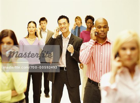 Portrait of Business People with Cellular Phones